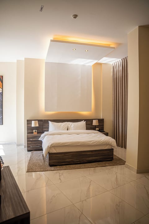 Family Suite, 2 Bedrooms, Balcony, City View | Minibar, in-room safe, blackout drapes, soundproofing
