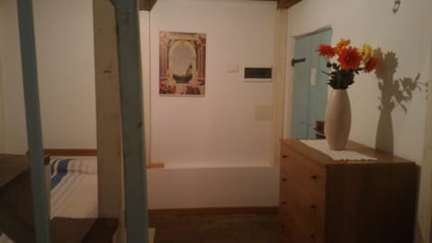 Economy Triple Room, Balcony | Living area