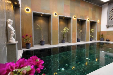 Indoor pool, outdoor pool, open 8:00 AM to 8:00 PM, sun loungers