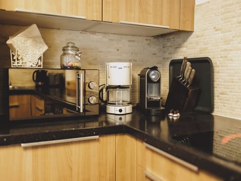 Deluxe Chalet, Mountain View | Private kitchen | Electric kettle, toaster, highchair