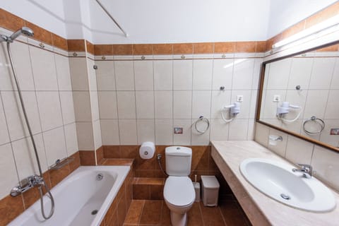 Hair dryer, towels, soap, shampoo