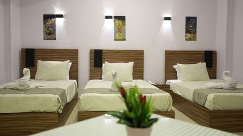 Triple Room, Balcony | In-room safe, blackout drapes, soundproofing, free WiFi