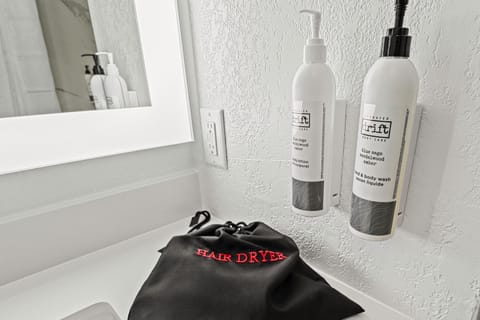 Separate tub and shower, hair dryer, towels, soap