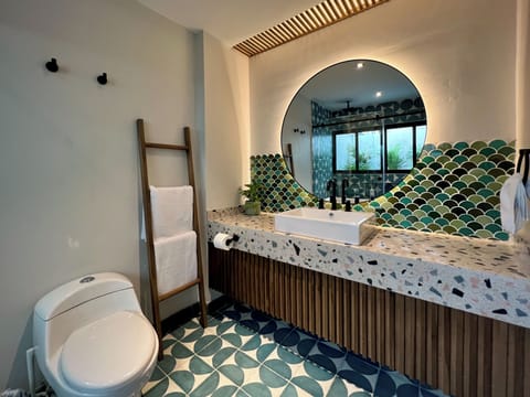 Shower, towels, soap, shampoo