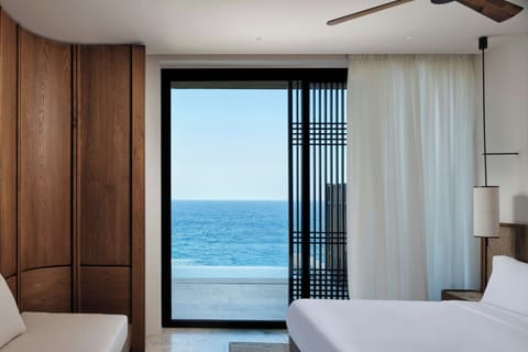 Earth-Sheltered Villa, Sea View, Private Pool, Terrace | Minibar, in-room safe, desk, blackout drapes