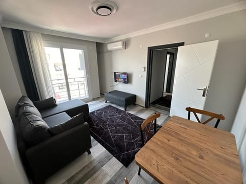 Luxury Suite, City View | Living area | 82-cm LCD TV with satellite channels