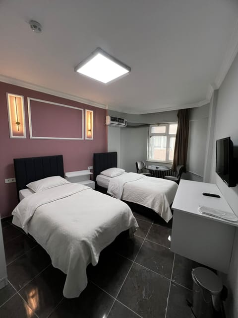 Basic Double Room, City View | Desk, laptop workspace, blackout drapes, iron/ironing board