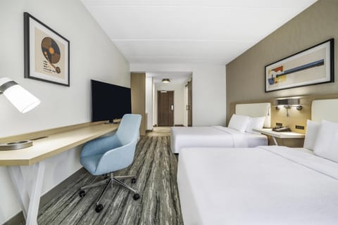 Room, 2 Queen Beds | Blackout drapes, iron/ironing board, free cribs/infant beds, bed sheets