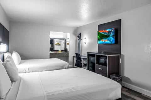 Pillowtop beds, desk, laptop workspace, blackout drapes