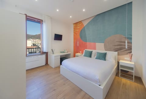 Deluxe Room, City View | Laptop workspace, blackout drapes, soundproofing, free WiFi