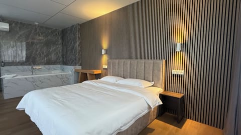 Luxury Room | Premium bedding, desk, laptop workspace, free WiFi