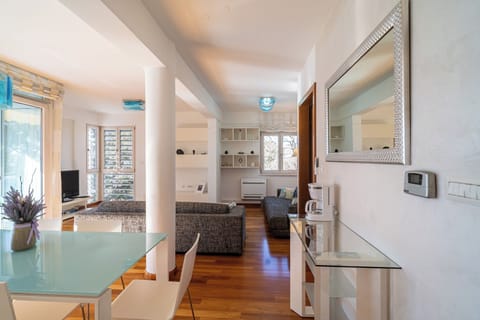 Apartment, Balcony, Sea View | Living area | Flat-screen TV