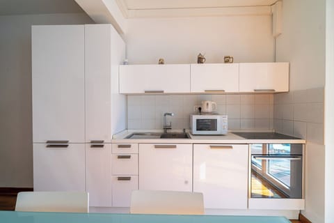 Apartment, Balcony, Sea View | Private kitchen | Electric kettle