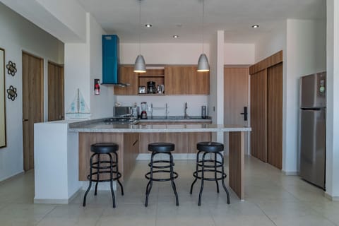 Deluxe Apartment, Balcony, Pool View | Private kitchen | Electric kettle