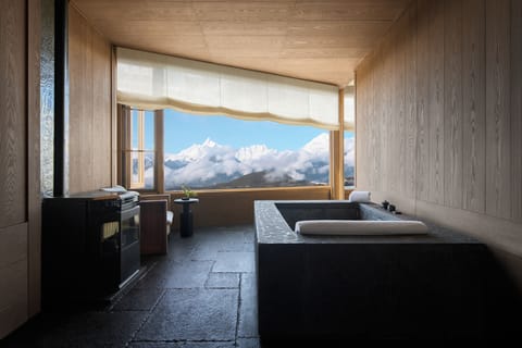 Luxury Suite, Mountain View | Bathroom | Hair dryer, slippers, towels, soap