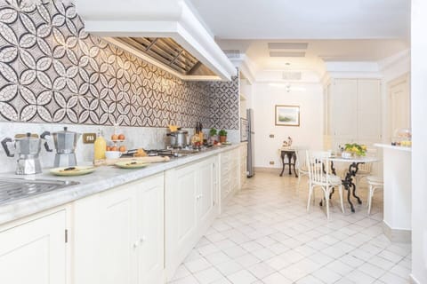 Villa | Private kitchen | Fridge, microwave, oven, stovetop