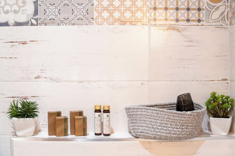 Shower, hair dryer, bathrobes, towels