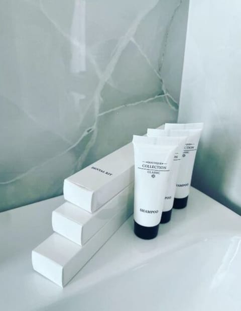 Shower, towels, toilet paper