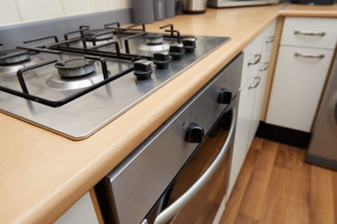 City Townhome, 4 Bedrooms, Kitchen, Garden View | Private kitchen | Full-size fridge, microwave, stovetop, electric kettle