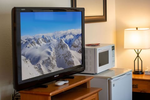 Deluxe Room, 2 Bedrooms (2 Queen Beds and 1 Queen Sofa Bed) | Living area | TV, DVD player