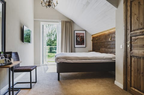 Premium Double Room, Balcony | Individually decorated, individually furnished, iron/ironing board