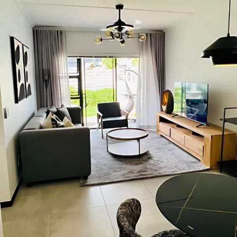Luxury Apartment, 1 Queen Bed, Kitchen, Garden View | Living area | Flat-screen TV