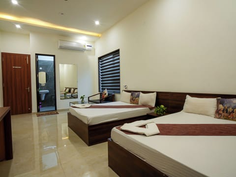 Family Quadruple Room, City View | Iron/ironing board, free WiFi