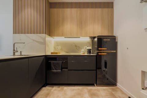 Family Apartment, Courtyard View, Garden Area | Private kitchen | Full-size fridge, microwave, oven, stovetop