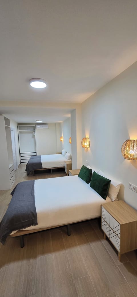 Family Suite, City View | Down comforters, minibar, blackout drapes, soundproofing