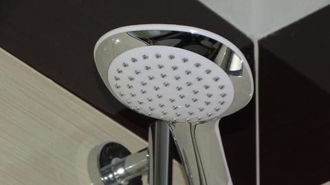 Quadruple Room | Bathroom | Shower, bathrobes, towels, toilet paper