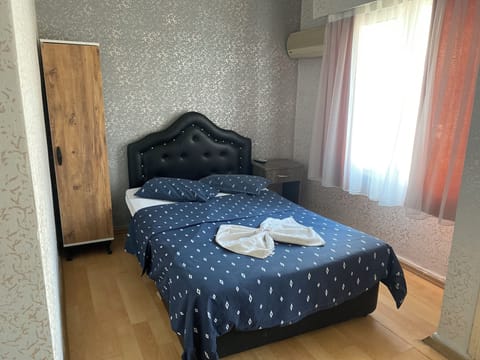 Economy Quadruple Room, City View | Desk, free WiFi