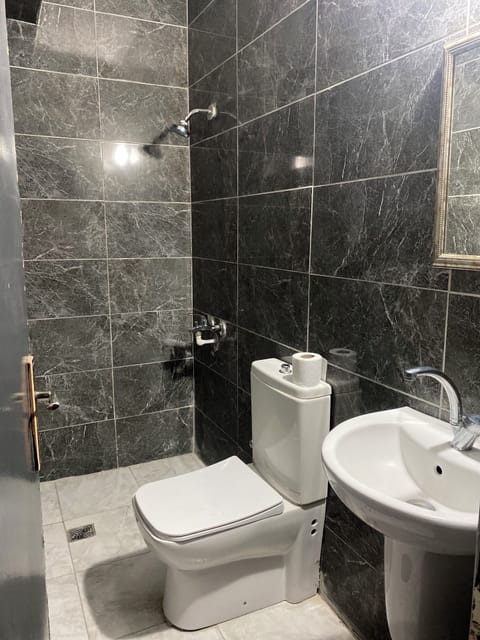 Economy Quadruple Room, City View | Desk, free WiFi