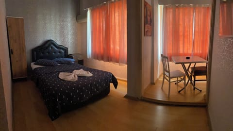 Economy Quadruple Room, City View | Desk, free WiFi