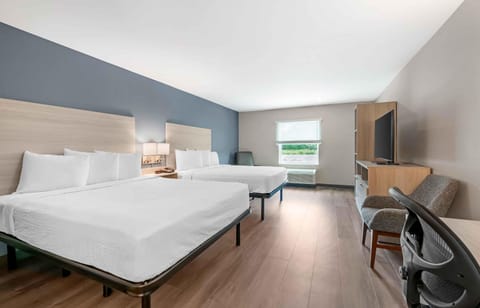 Desk, laptop workspace, free WiFi, bed sheets