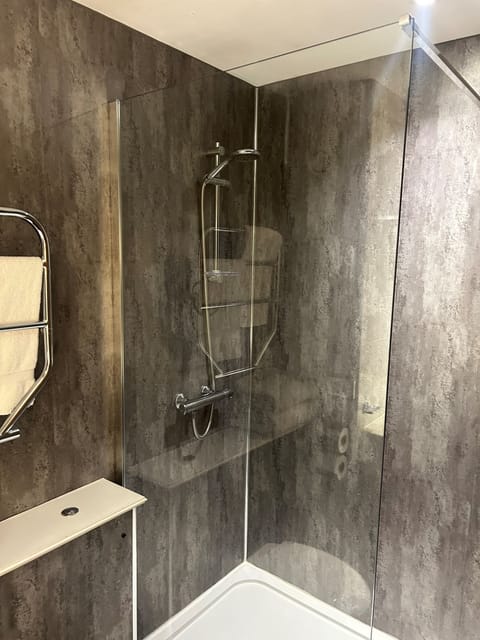 Shower, free toiletries, hair dryer, towels