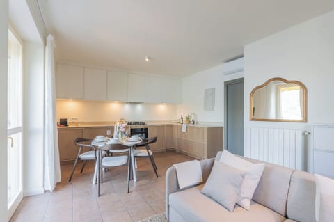 Apartment (2 Bedrooms) | Living area | 32-inch Smart TV with cable channels