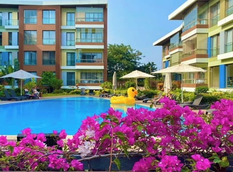 Outdoor pool, open 6:00 AM to 9:30 PM, pool umbrellas, sun loungers
