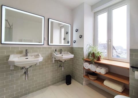 Shower, rainfall showerhead, hair dryer, towels