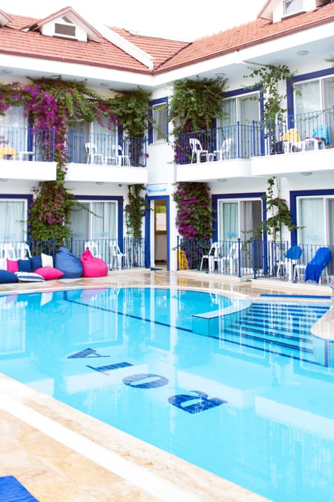 Seasonal outdoor pool, pool umbrellas, sun loungers
