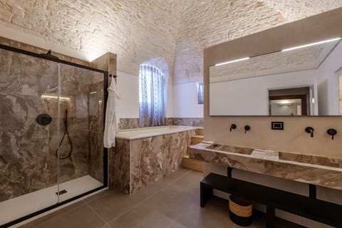 Superior Suite, City View | Bathroom | Shower, free toiletries, hair dryer, bathrobes