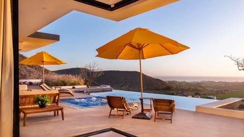 Outdoor pool, open 8:00 AM to 10:00 PM, pool umbrellas, sun loungers