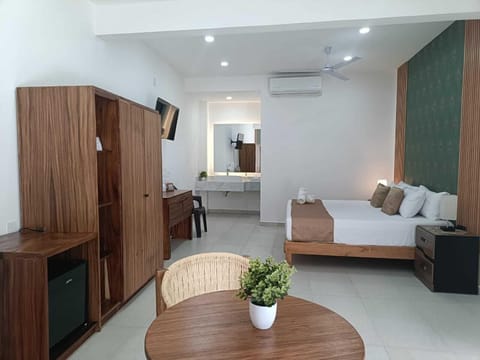 Family Studio Suite | Hypo-allergenic bedding, down comforters, in-room safe, blackout drapes