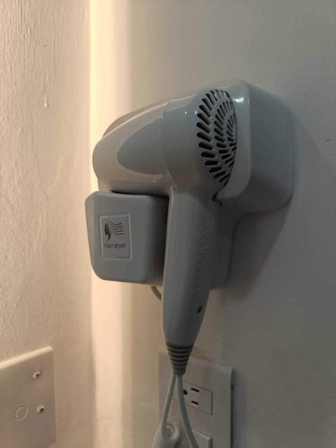 Family Studio Suite | Bathroom | Shower, hair dryer, towels, soap