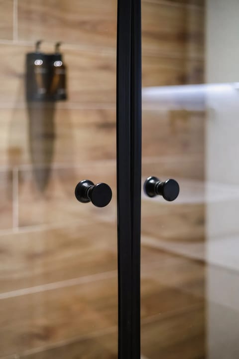 Shower, free toiletries, hair dryer, slippers