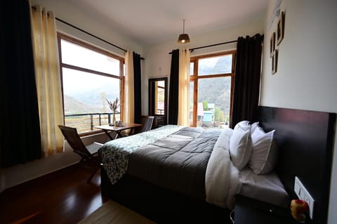 Premium Double Room, Balcony, Mountain View | Blackout drapes, iron/ironing board, rollaway beds, free WiFi