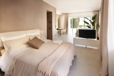 Superior Studio Suite, City View | Free minibar, desk, laptop workspace, free WiFi