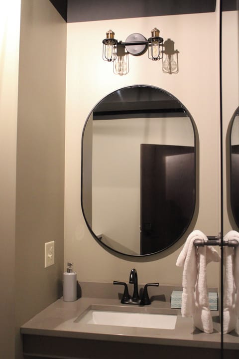 The Dalton | Bathroom | Shower, hair dryer, towels, soap