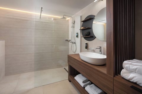 Shower, free toiletries, hair dryer, slippers