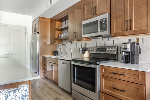 Fridge, microwave, stovetop, coffee/tea maker