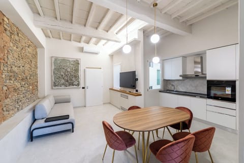 Townhome | Living area | 50-inch Smart TV with digital channels